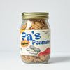 A jar of Pa's Peanuts with blue, red, and yellow colors on the label. The peanuts are toasty and crunchy looking!  You can see the salt on the peanuts. 